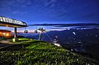 Sonnwendfeuer zur Sommersonnenwende am Brandstadl in Scheffau mit Blick zu Wilder Kaiser mit Fackeln_(c)Christian Kapfinger